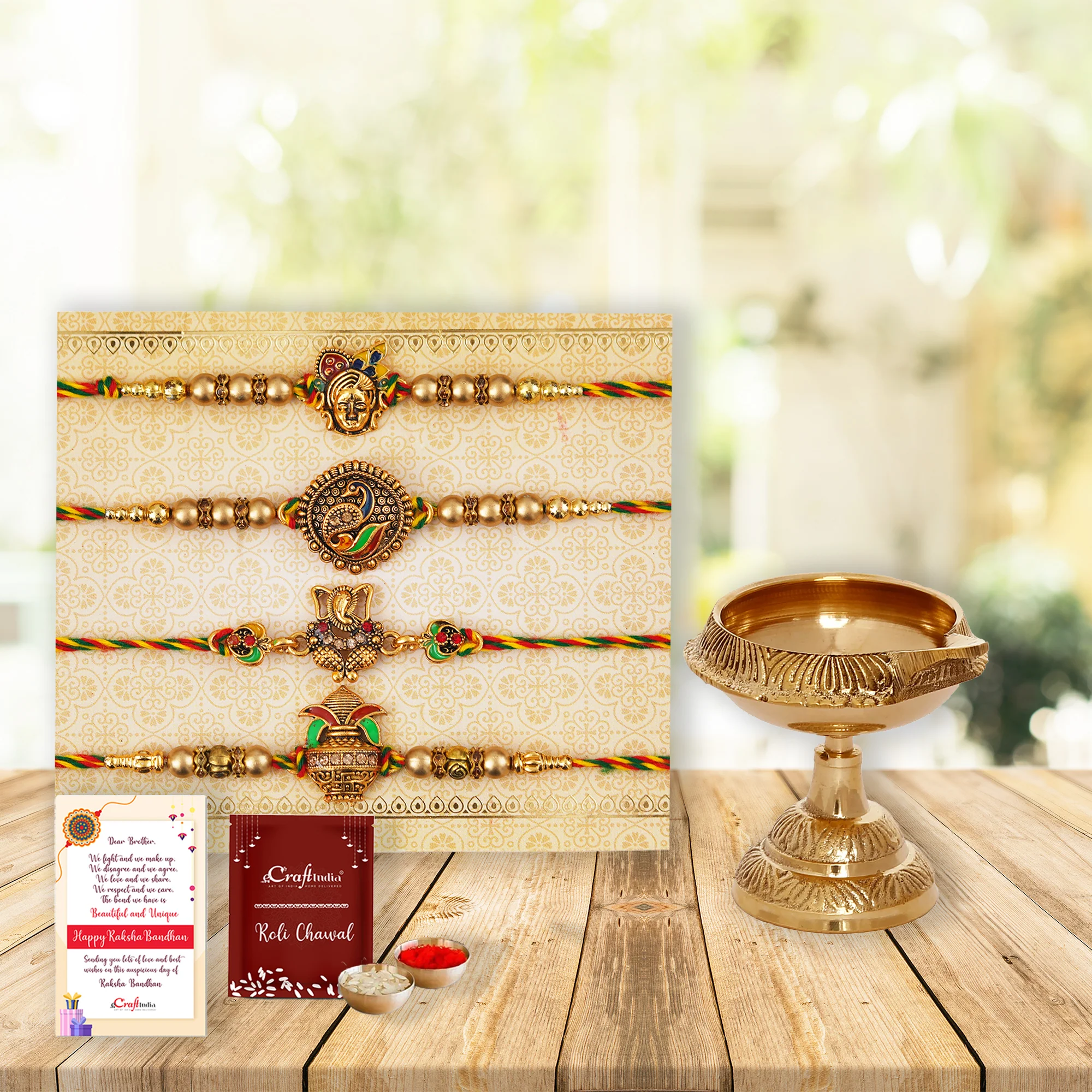 Set of 4 Shrinathji, Peacock, Ganesha, Kalash Designer Rakhis with Brass Diya and Raksha Bandhan Greeting Card | Roli Chawal Pack | Rakhi Gift Hamper for Brother Bhaiya Bhai